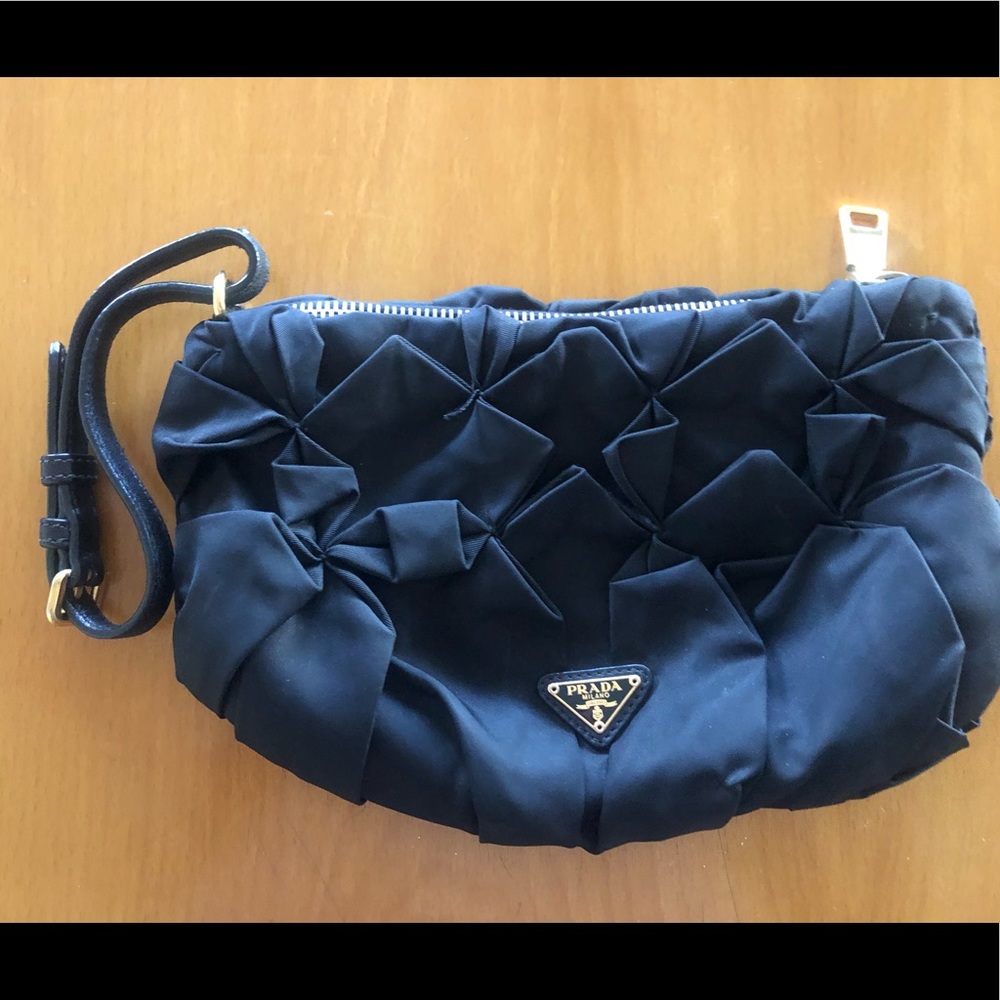 Prada quilted satin black clutch.